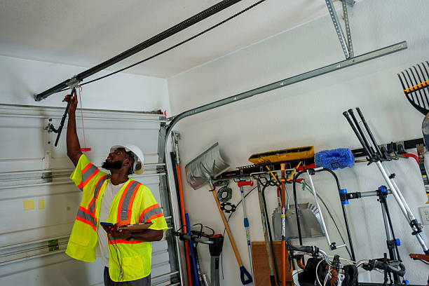 Professional Garage Door Panel Replacement technician working in Bergenfield, NJ
